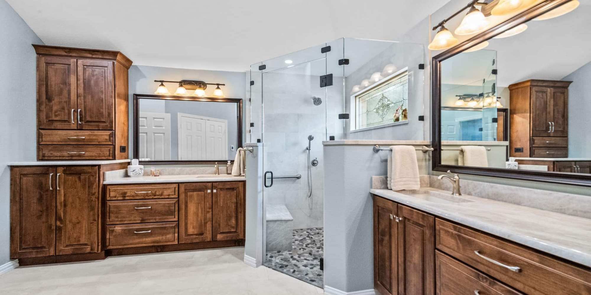 Elite Remodeling creates an aging-friendly Frisco bath with a seated shower, grab bar, and wide entry