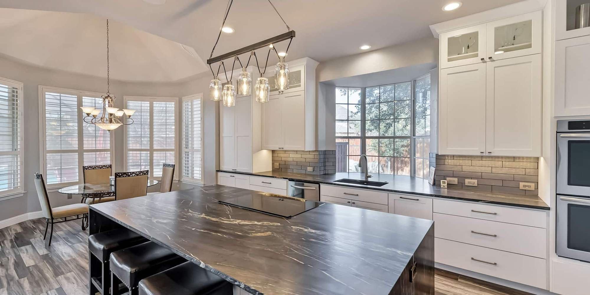 Kitchen remodel by Elite Remodeling in Frisco with sleek appliances and neutral palette