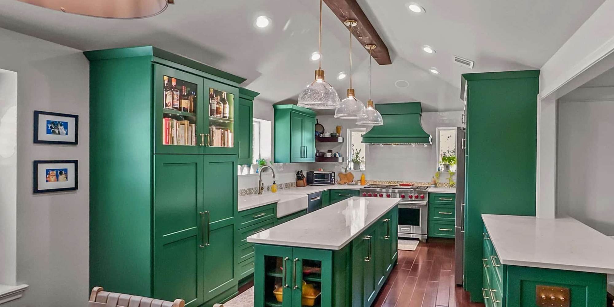Transitional kitchen cabinets with recessed panel doors and brass hardware by Elite Remodeling