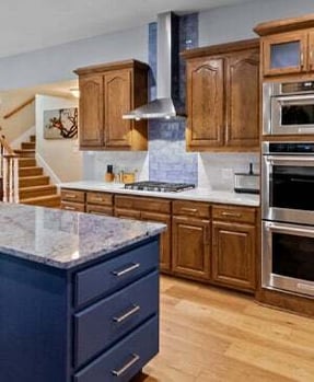 The Return of Warmth: Moving Beyond the  All-White Kitchen