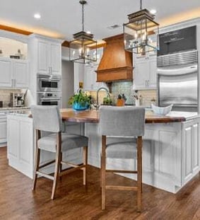 The Return of Warmth: Moving Beyond the  All-White Kitchen